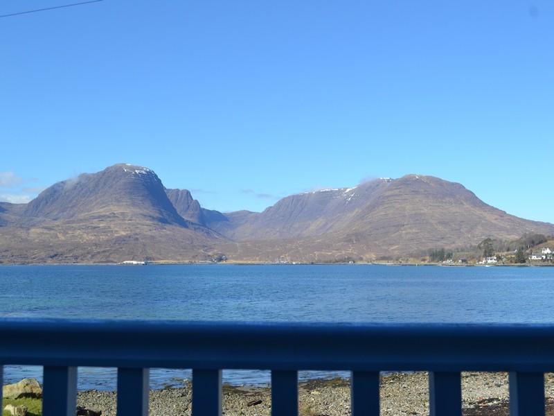 view from balcony over loch kishorn to the bealach na ba